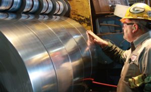 Man looking at steel